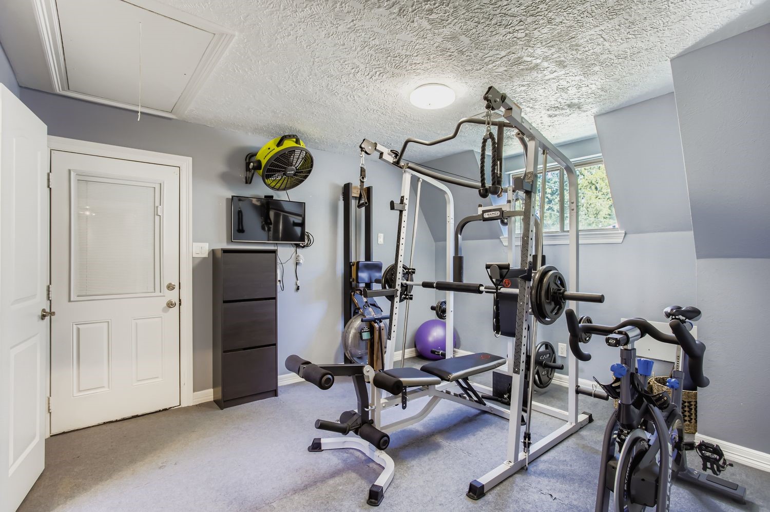 16614 Creeksouth Road Houston, TX 77068 - Photo 25 of 36 a view of a room with gym equipment