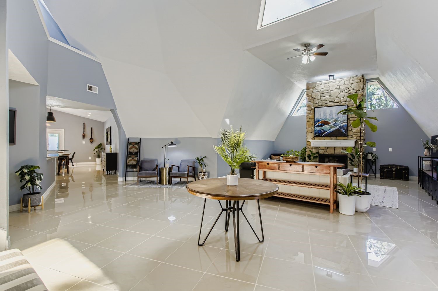 16614 Creeksouth Road Houston, TX 77068 - Photo 7 of 36 a living room with furniture and a chandelier