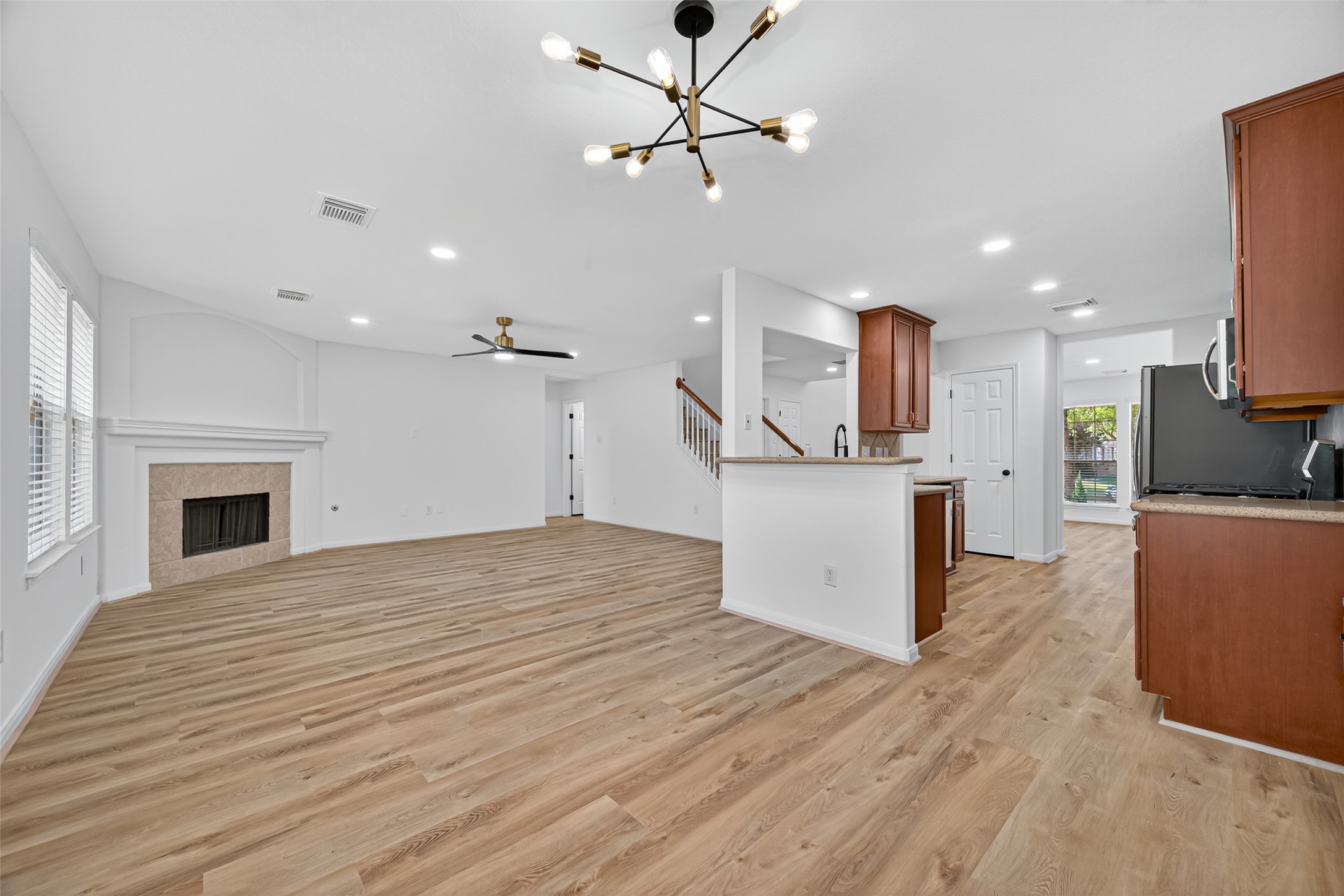 17422 Bending Post Drive Houston, TX 77095 - Photo 18 of 50 a view of a kitchen with microwave and cabinets