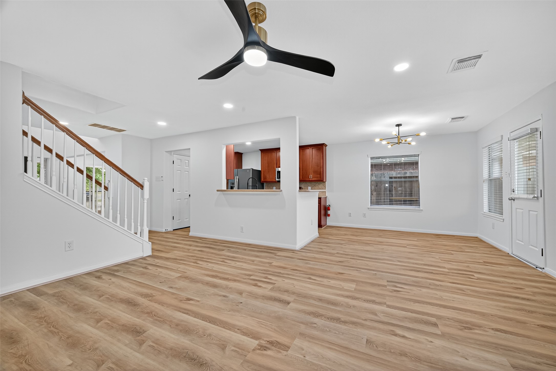 17422 Bending Post Drive Houston, TX 77095 - Photo 26 of 50 a view of an empty room with wooden floor and a window