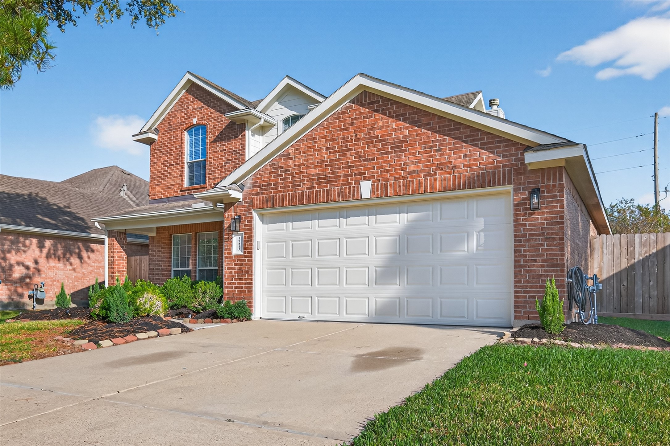 17422 Bending Post Drive Houston, TX 77095 - Photo 4 of 50 front view of a house with a yard