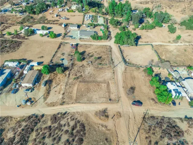a aerial view of a house with a trees