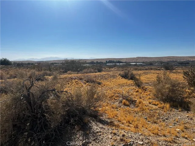 an aerial view of residential building and ocean