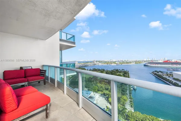a view of balcony with furniture