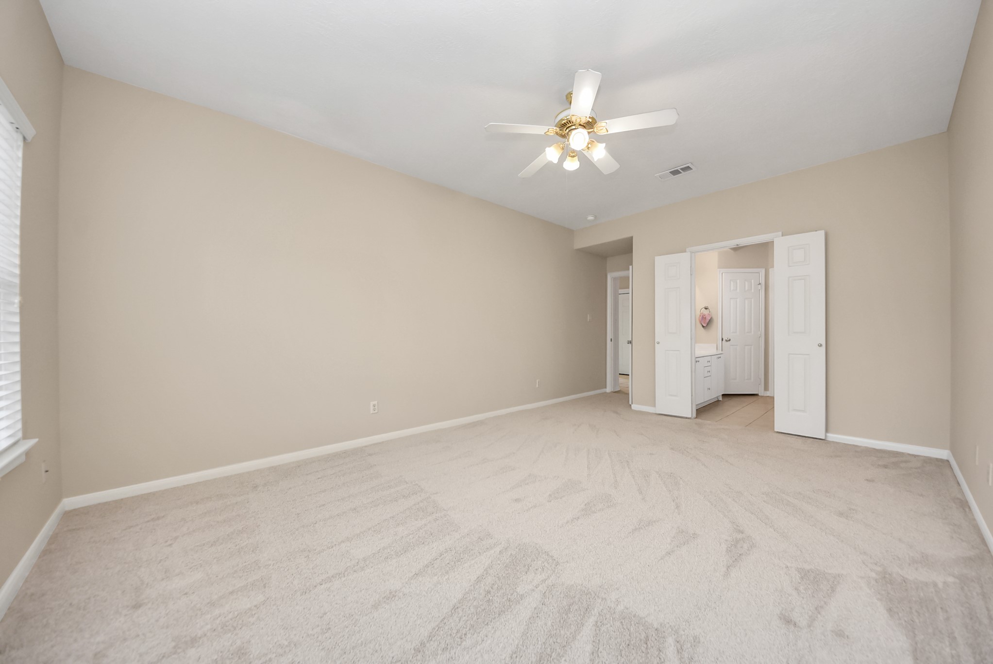 18963 Candlelight Crescent Road Spring, TX 77388 - Photo 18 of 33 This relaxing master bedroom creates flexibility for a variety of design styles.