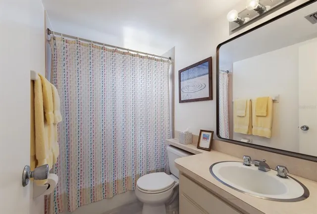 an aerial view of a house with a swimming pool