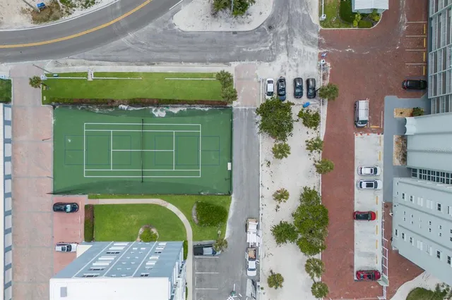 a view of a balcony with chairs