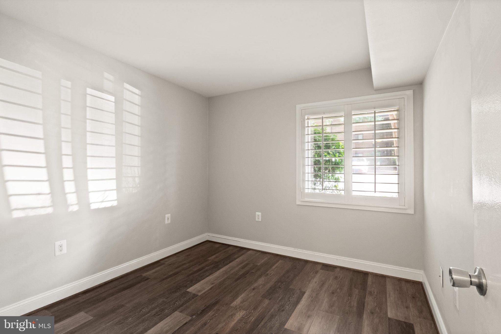 1414 Northgate Square, Unit 14/1B Reston, VA 20190 - Photo 26 of 49 Custom shutters throughout the main level