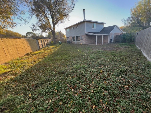 2007 Bridge Cross Lane Houston, TX 77067 - Photo 4 of 13 a view of a house with a yard