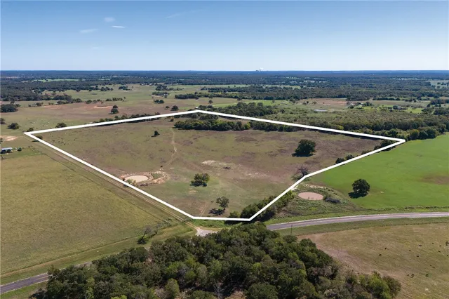 a view of a swimming pool with a balcony