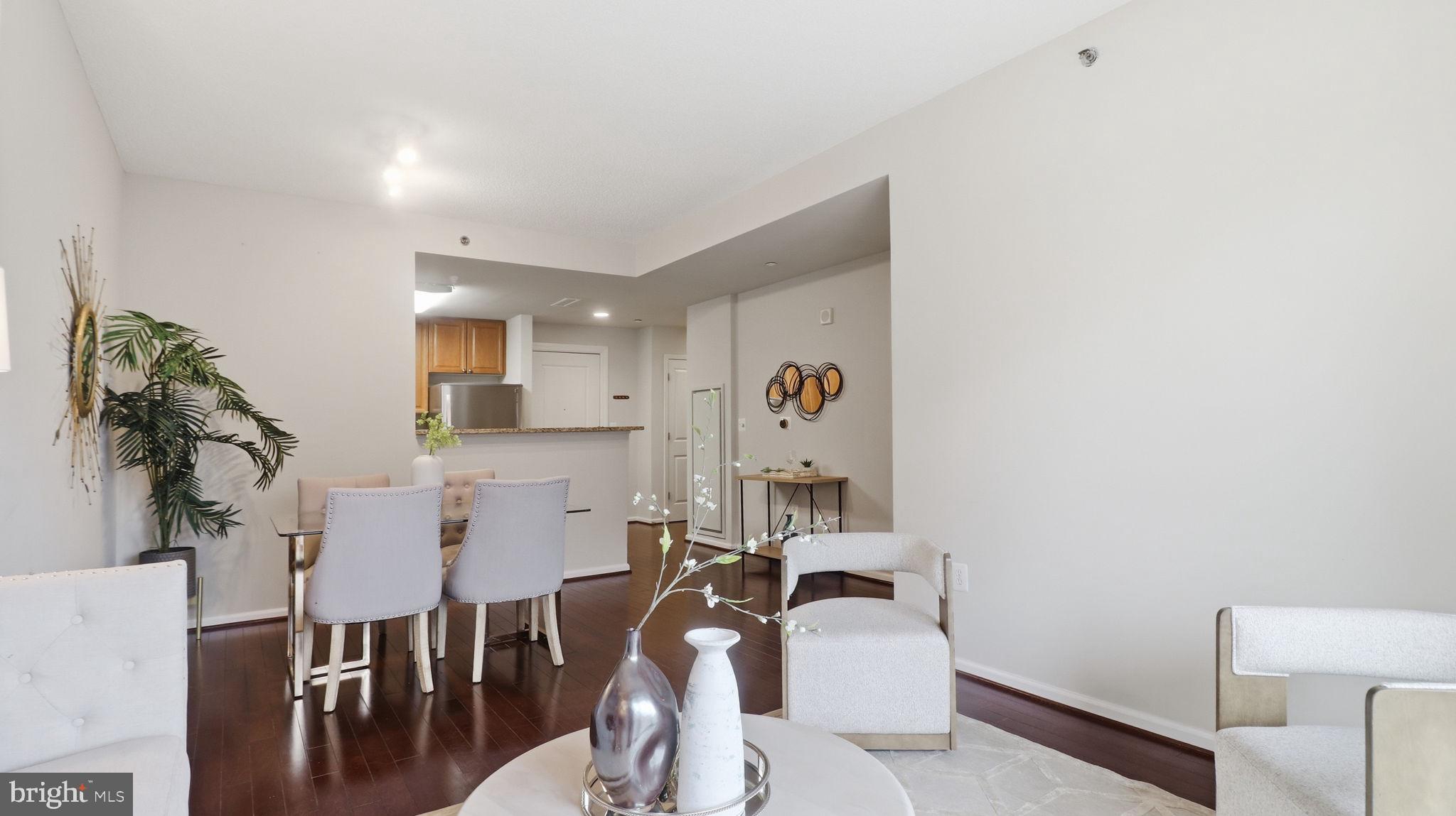 11700 Old Georgetown Road, Unit 1007 North Bethesda, MD 20852 - Photo 6 of 36 Modern elegance in open living space.