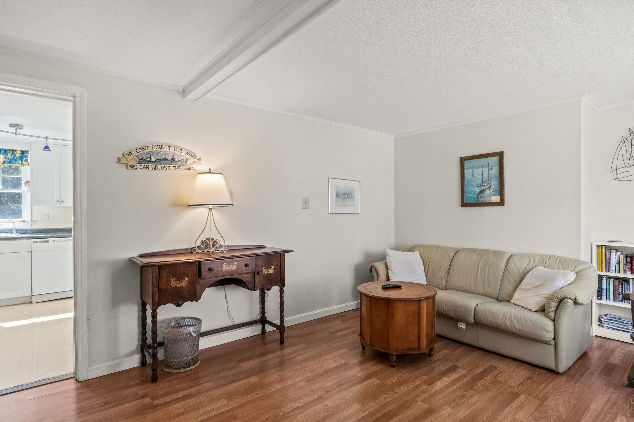 153 Long Road Harwich Port, MA 02646 - Photo 5 of 44 a living room with furniture and a wooden floor
