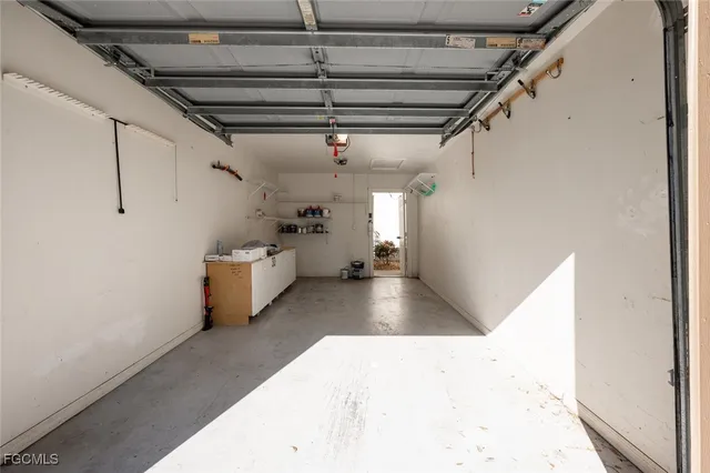 a view of a hallway with stairs