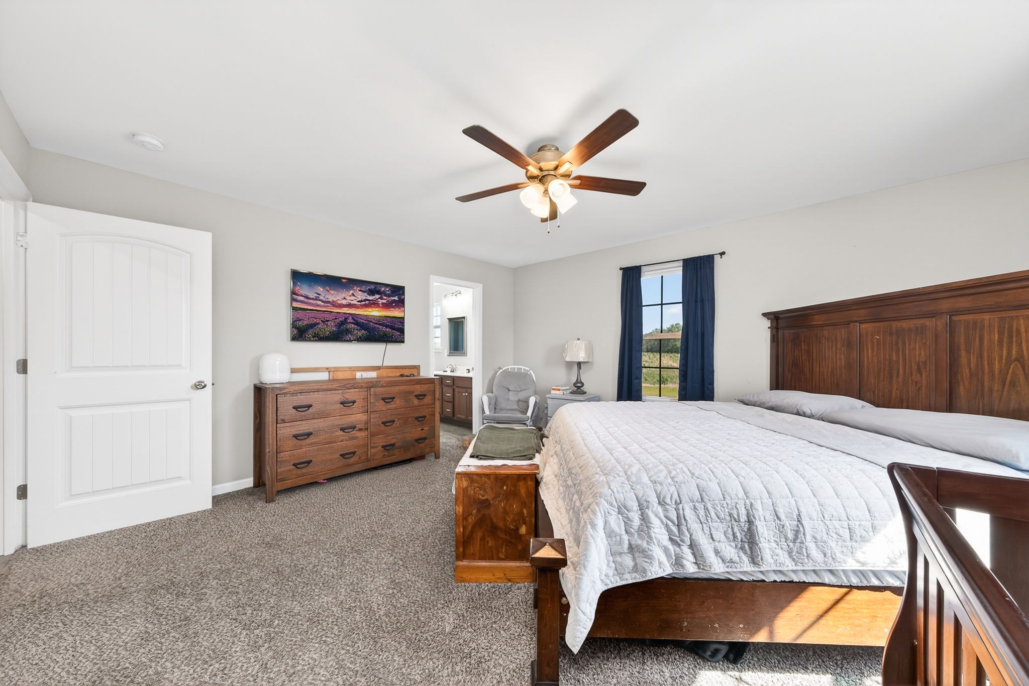 144 Liberty Road Sparta, TN 38583 - Photo 8 of 24 a bedroom with a bed and a tv on the dresser