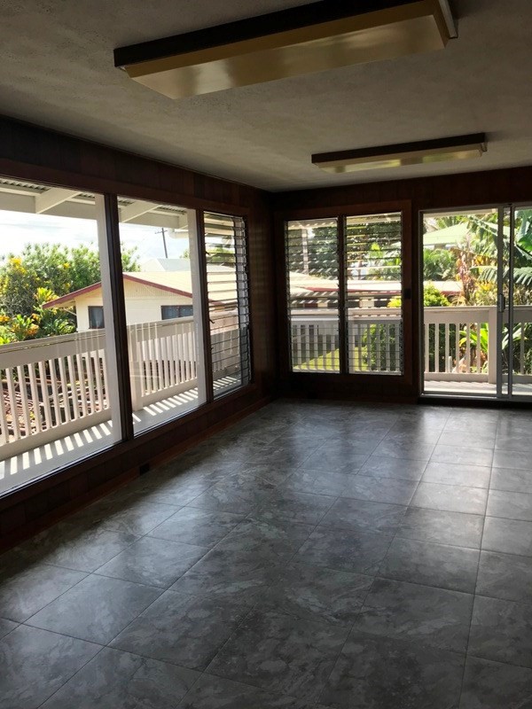 744 A Wainaku Street Hilo, HI 96720 - Photo 11 of 23 a view of a room with large windows
