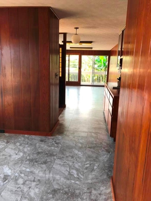 744 A Wainaku Street Hilo, HI 96720 - Photo 7 of 23 wooden floor in an empty room with a window