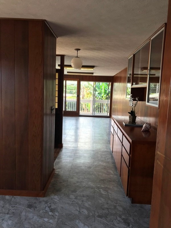 744 A Wainaku Street Hilo, HI 96720 - Photo 9 of 23 wooden floor in an empty room with a window