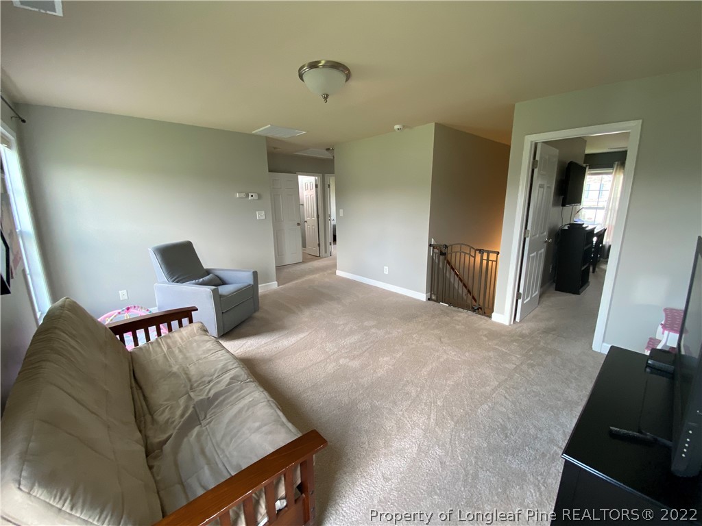 269 Declaration Drive Raeford, NC 28376 - Photo 16 of 26 a living room with furniture