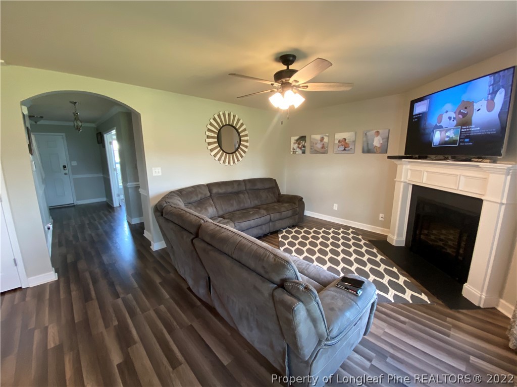 269 Declaration Drive Raeford, NC 28376 - Photo 7 of 26 a living room with furniture and a flat screen tv