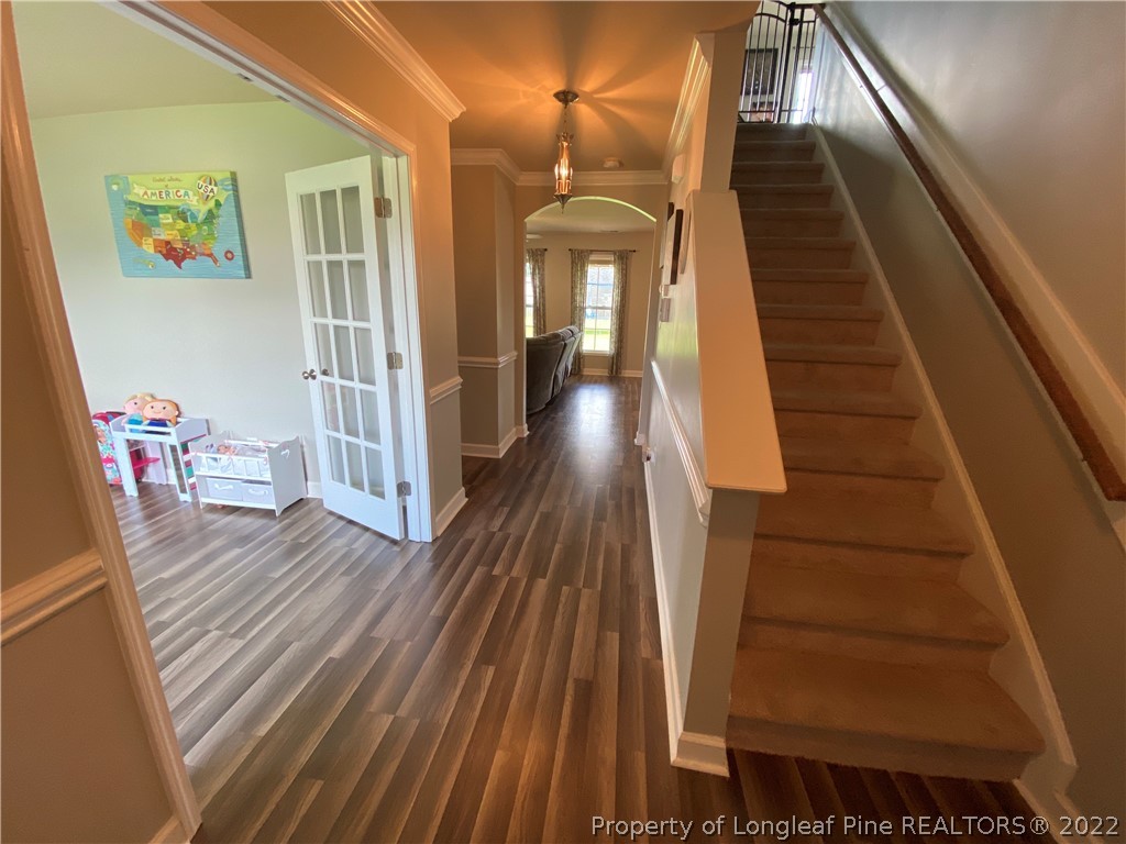 269 Declaration Drive Raeford, NC 28376 - Photo 9 of 26 a view of entryway with wooden floor