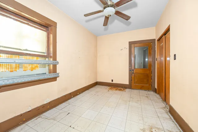 a view of an empty room and window