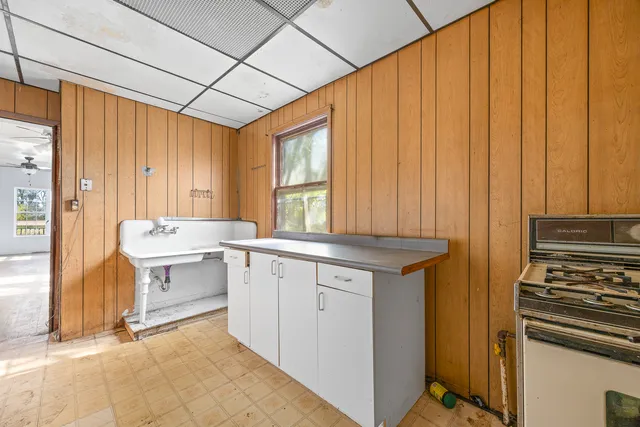 a kitchen with a stove and a sink