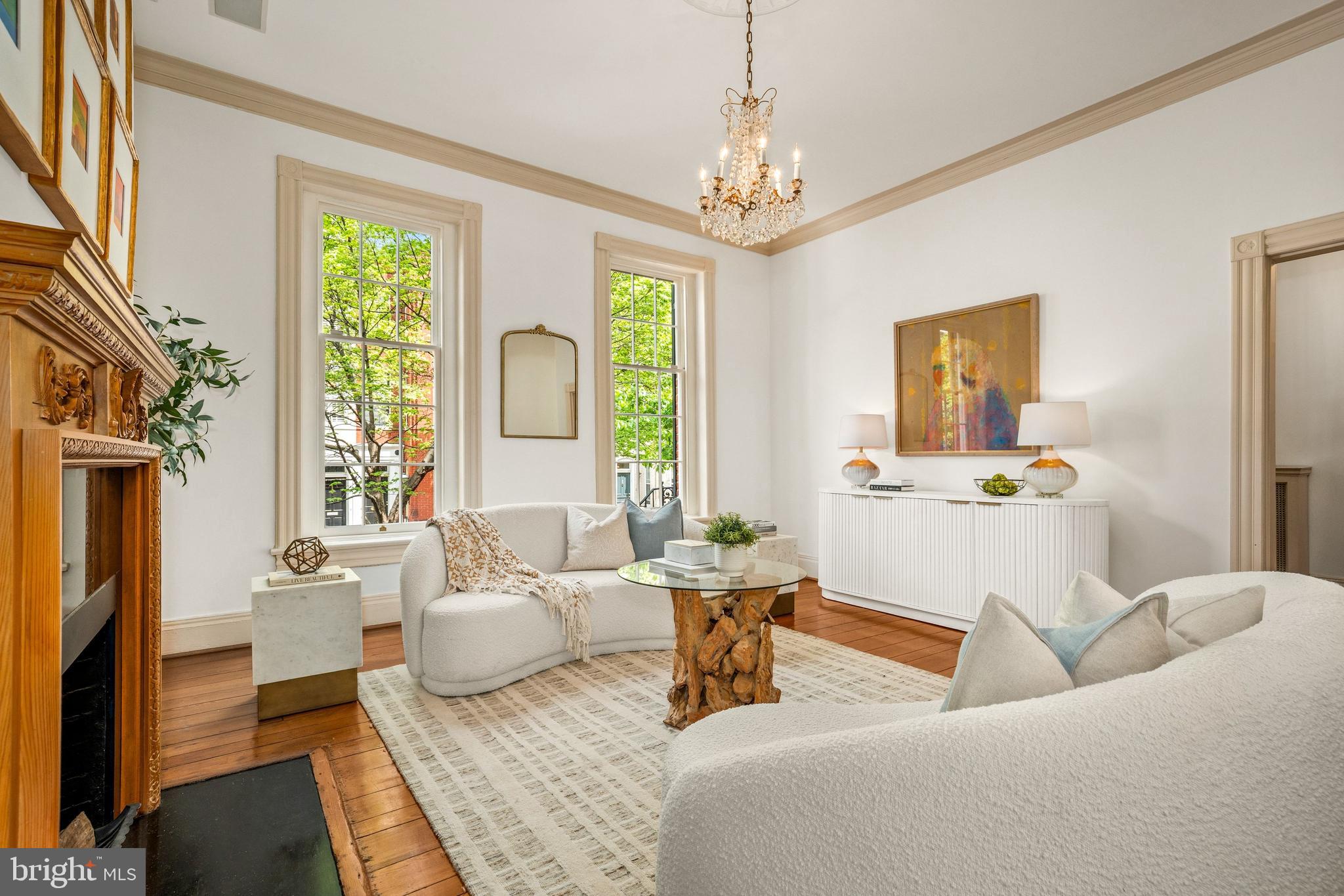 3316 N Street Northwest Washington, DC 20007 - Photo 3 of 18 a living room with furniture and a chandelier