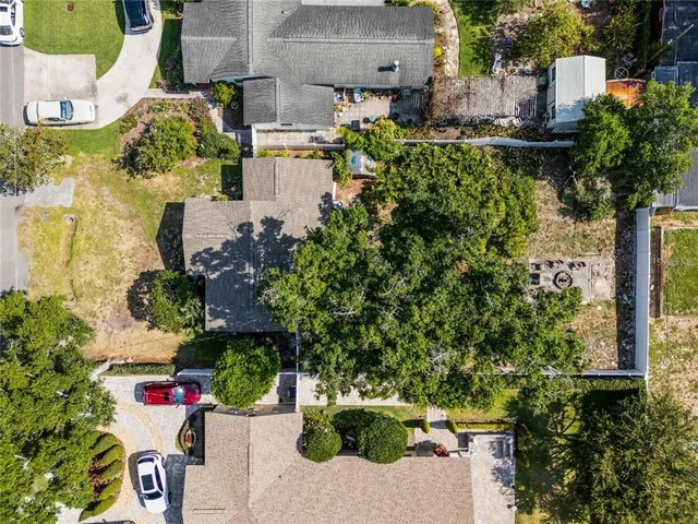 an aerial view of residential house with outdoor space