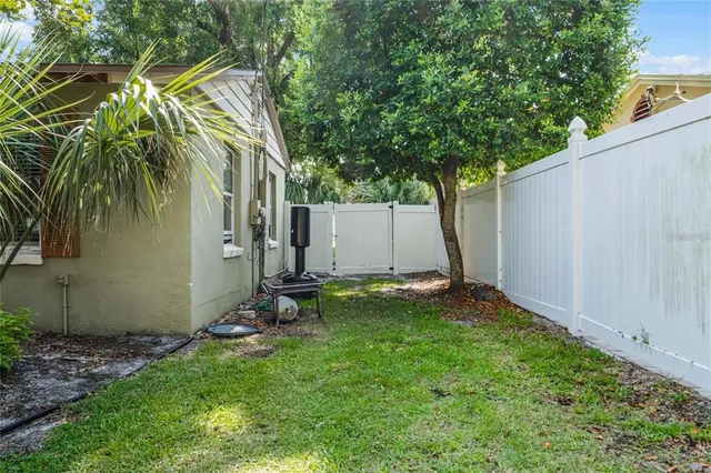 a backyard of a house with seating space
