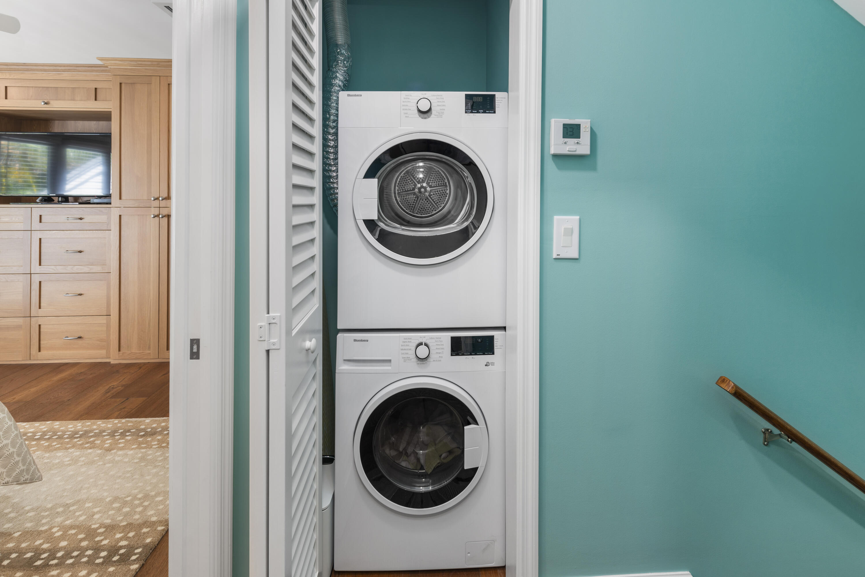 101 Front Street, Unit 23 Key West, FL 33040 - Photo 25 of 49 Stacked Washer and Dryer