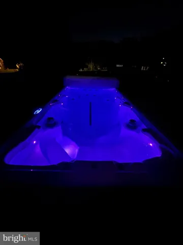 a view of yard with outdoor seating and trees