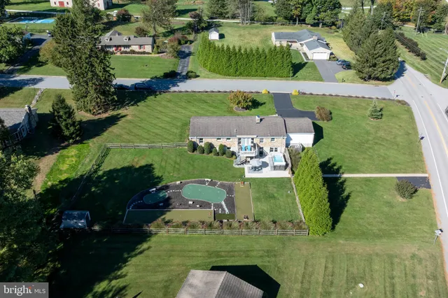 an aerial view of a pool