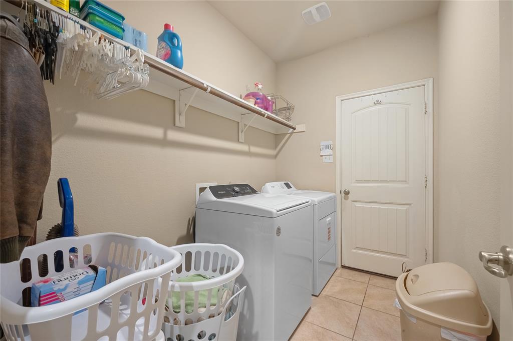 520 Rustic Oak Lane McKinney, TX 75072 - Photo 22 of 30 Dedicated laundry area featuring ceramic tile flooring
