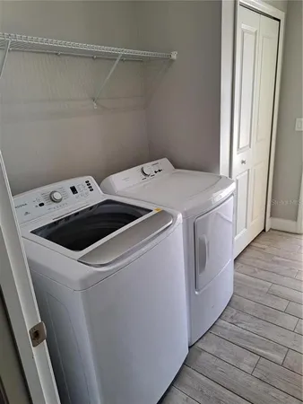 a utility room with dryer and washer