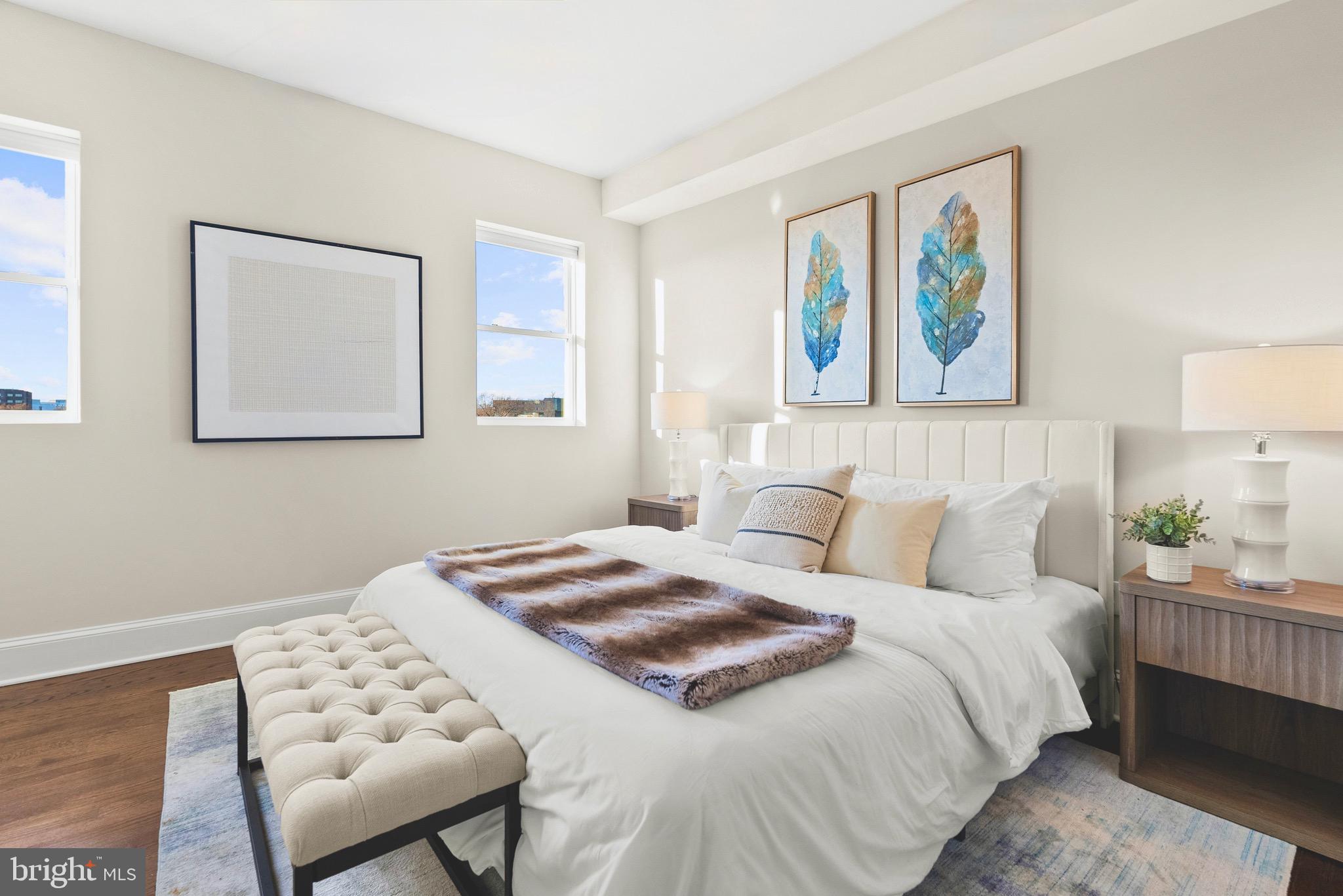 1627 Montello Avenue Northeast Washington, DC 20002 - Photo 11 of 17 a bedroom with a bed and a painting on the wall