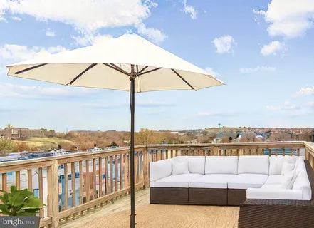 a view of a terrace with couches