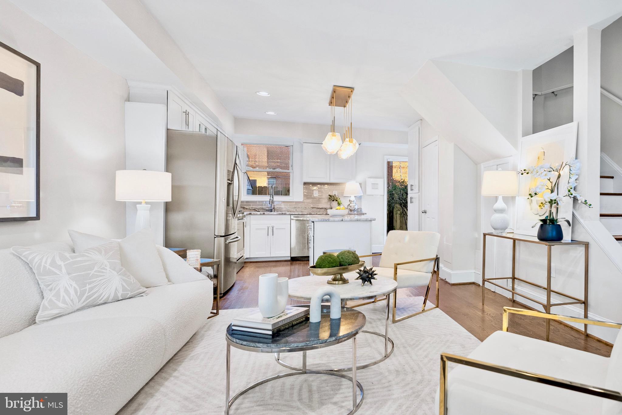 1627 Montello Avenue Northeast Washington, DC 20002 - Photo 4 of 17 a living room with furniture and a table