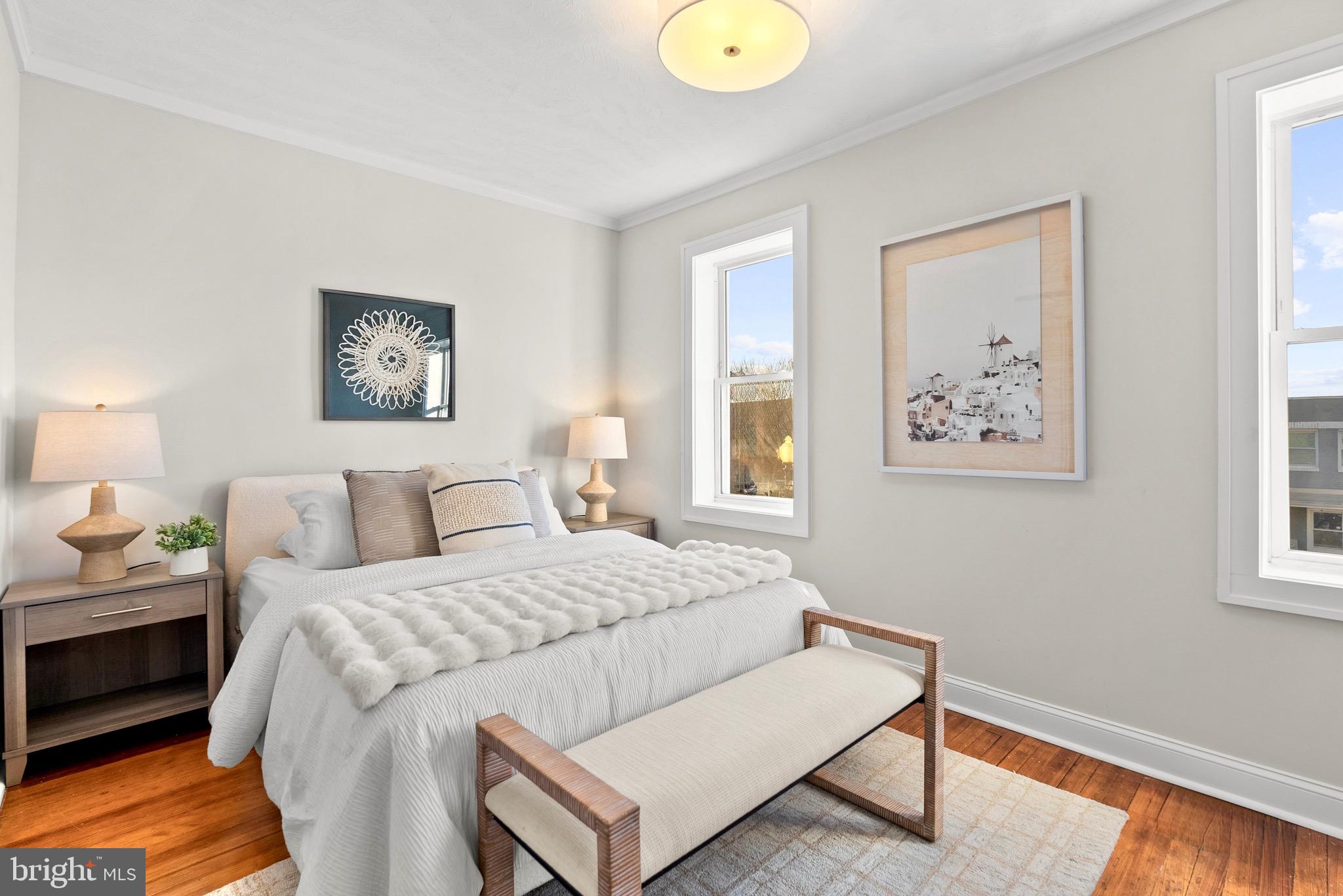 1627 Montello Avenue Northeast Washington, DC 20002 - Photo 7 of 17 a bedroom with a bed and a window