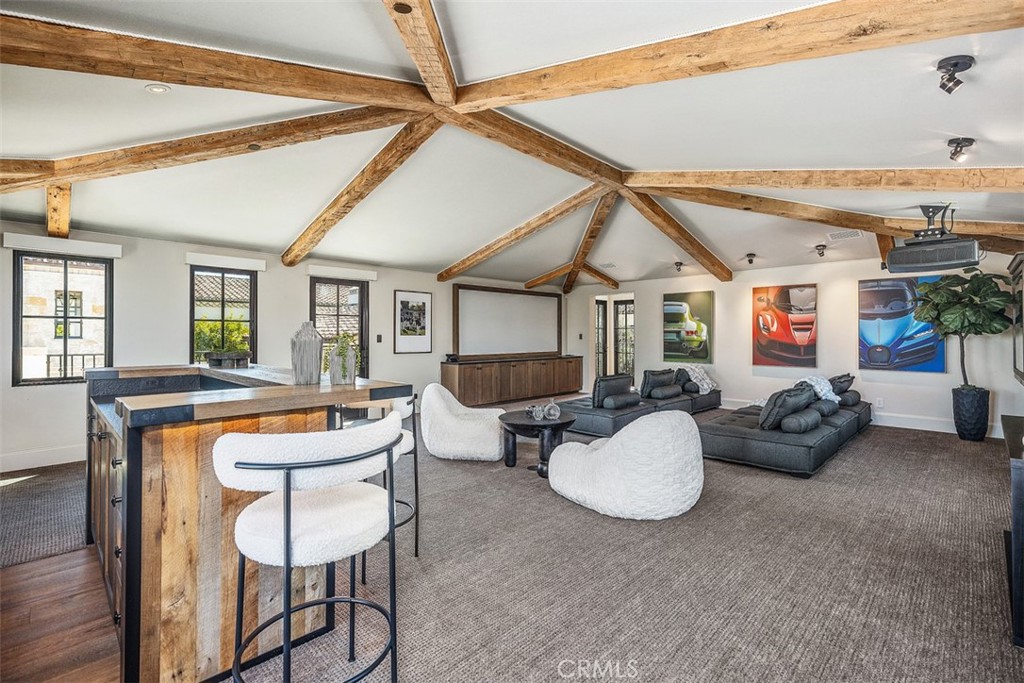 17 Pacific Ridge Place Dana Point, CA 92629 - Photo 28 of 47 a living room with furniture a flat screen tv and a window