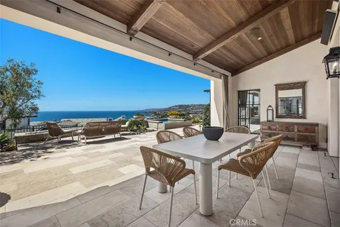 a view of a terrace with sitting area