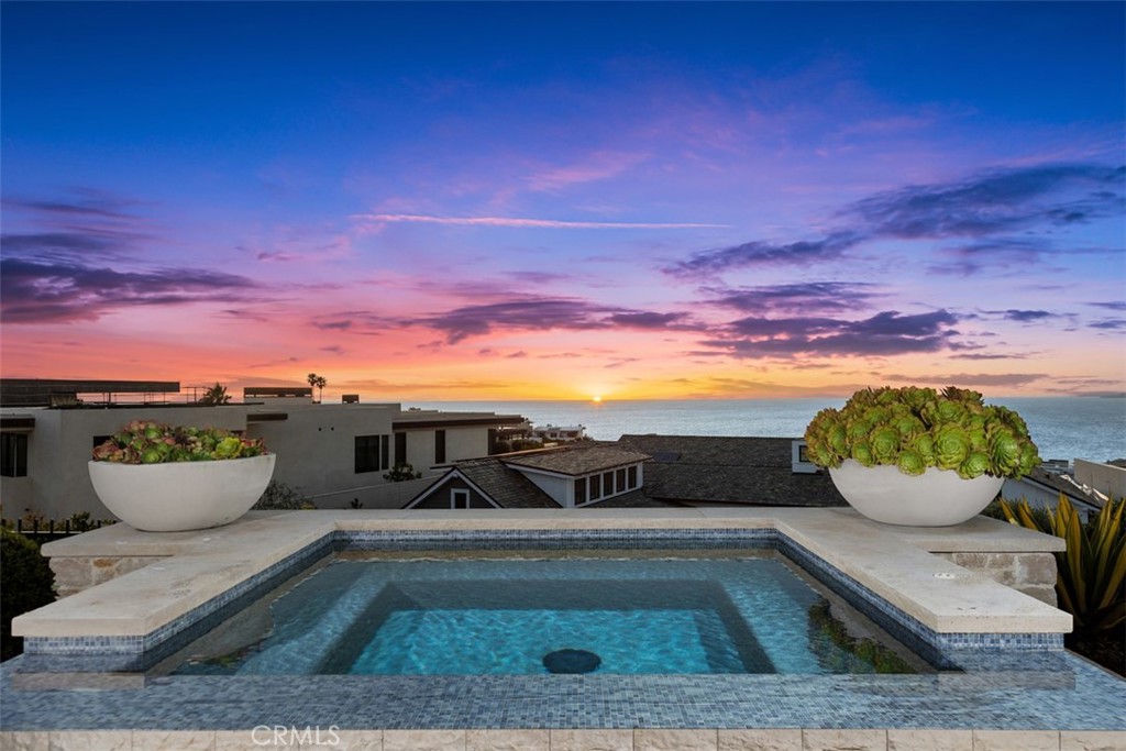 17 Pacific Ridge Place Dana Point, CA 92629 - Photo 45 of 47 a view of a swimming pool with a lounge chair