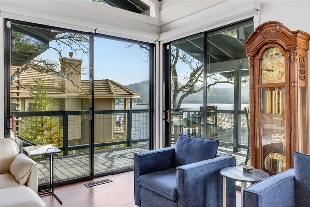 a view of a hallway with windows