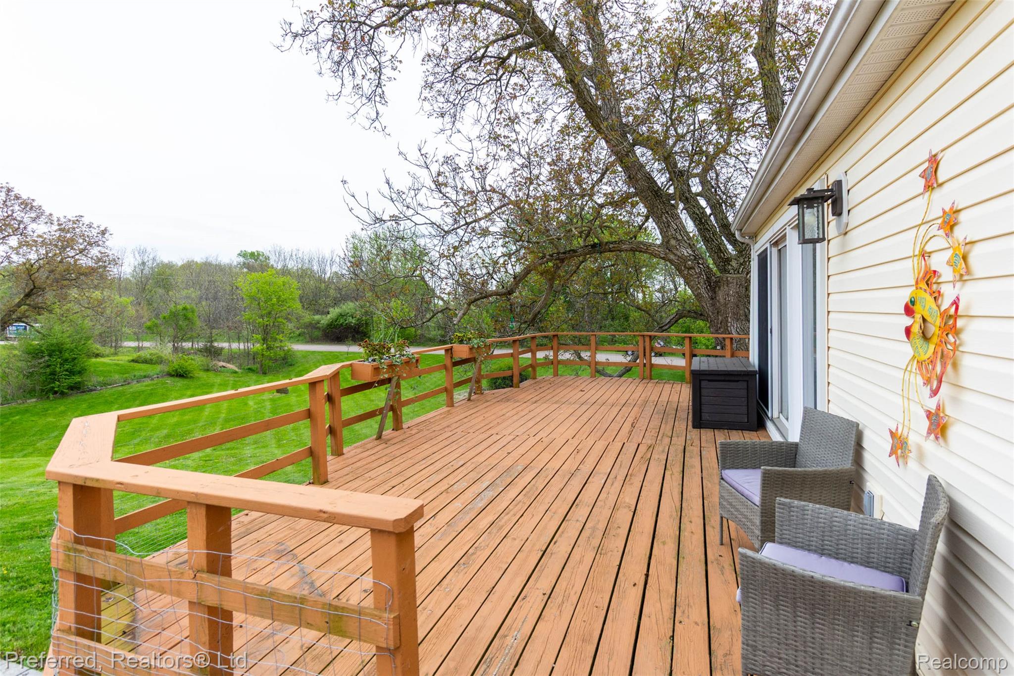 9840 Currie Road Northville, MI 48167 - Photo 47 of 62 Deck with a lawn
