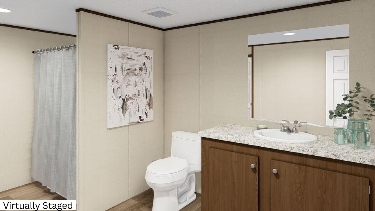 5489 Forge Road Glasgow, VA 24555 - Photo 13 of 38 a bathroom with a granite countertop sink toilet and shower