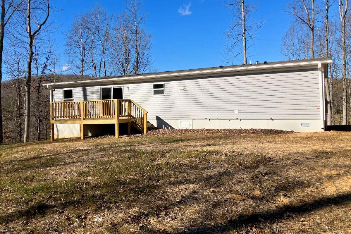 5489 Forge Road Glasgow, VA 24555 - Photo 26 of 38 a view of a house with a backyard