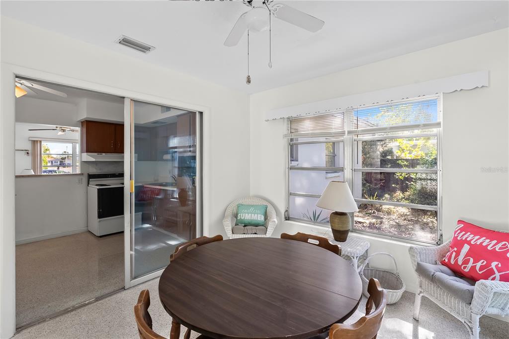 10609 Raffia Drive Port Richey, FL 34668 - Photo 12 of 24 a room with furniture and a window