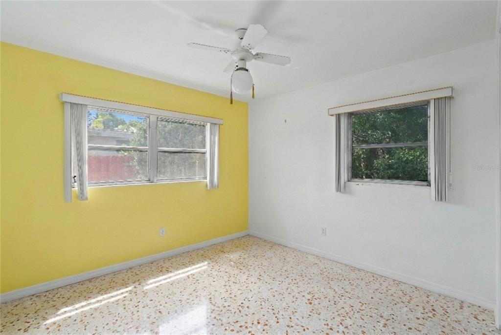 10609 Raffia Drive Port Richey, FL 34668 - Photo 17 of 24 a view of an empty room with a window