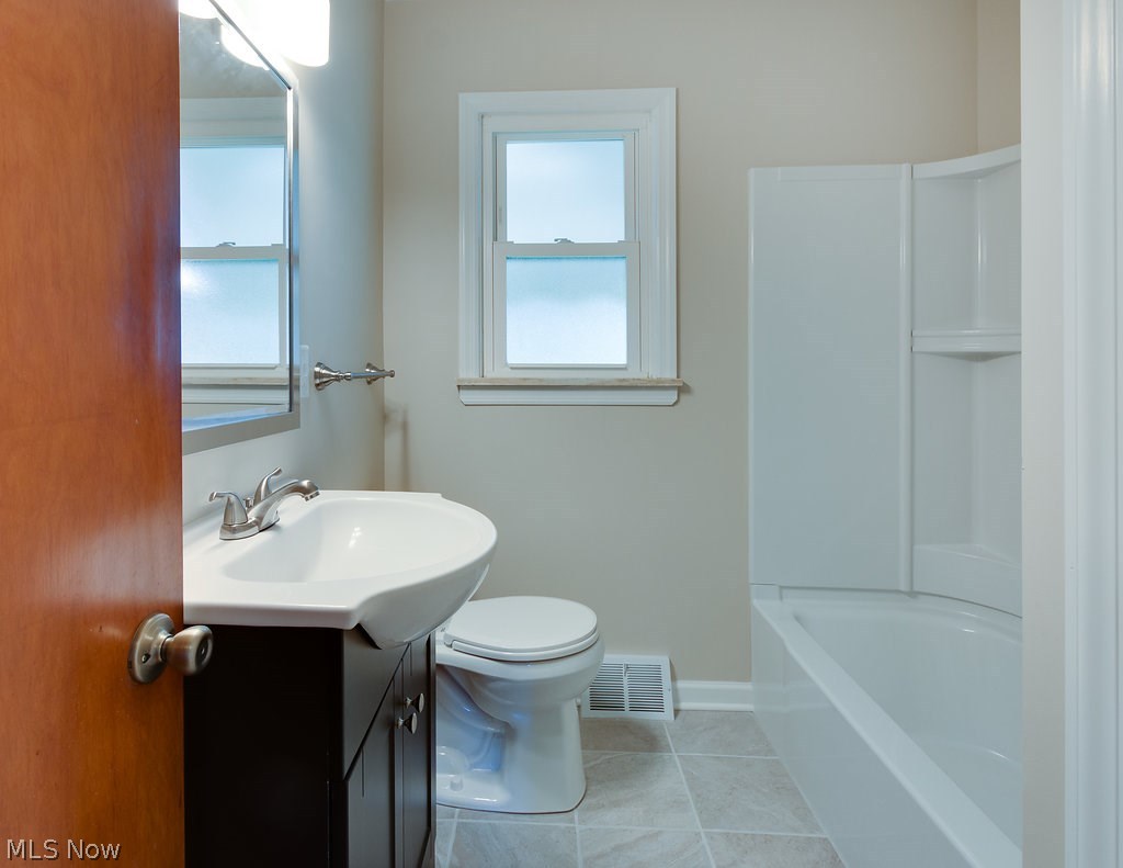 30306 Ridge Road Wickliffe, OH 44092 - Photo 14 of 31 Beautifully Remodeled Bathroom is convenient to all 3 Bedrooms