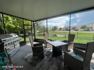 a outdoor space with furniture and outdoor view