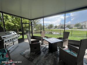1015 Swiss Pointe Lane Rockledge, FL 32955 - Photo 11 of 26 a outdoor space with furniture and outdoor view